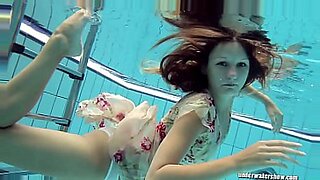girl spreads her legs in pool